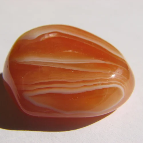 Carnelian: Meaning, Root Chakra Connection, Benefits & How to Use It